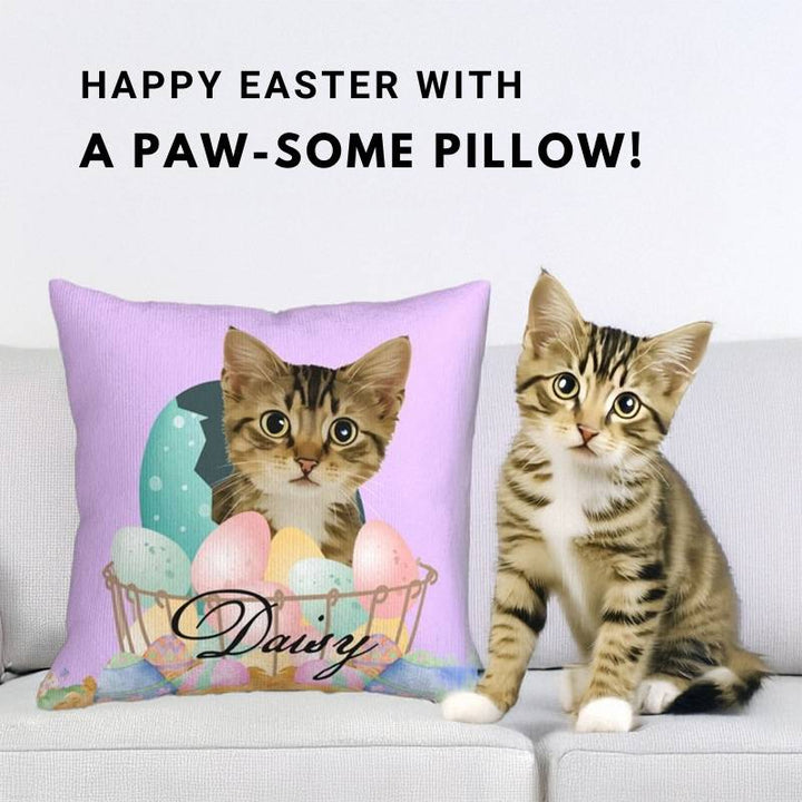 Easter-themed custom pet pillow featuring a kitten with pastel eggs, placed next to a real cat on a sofa.